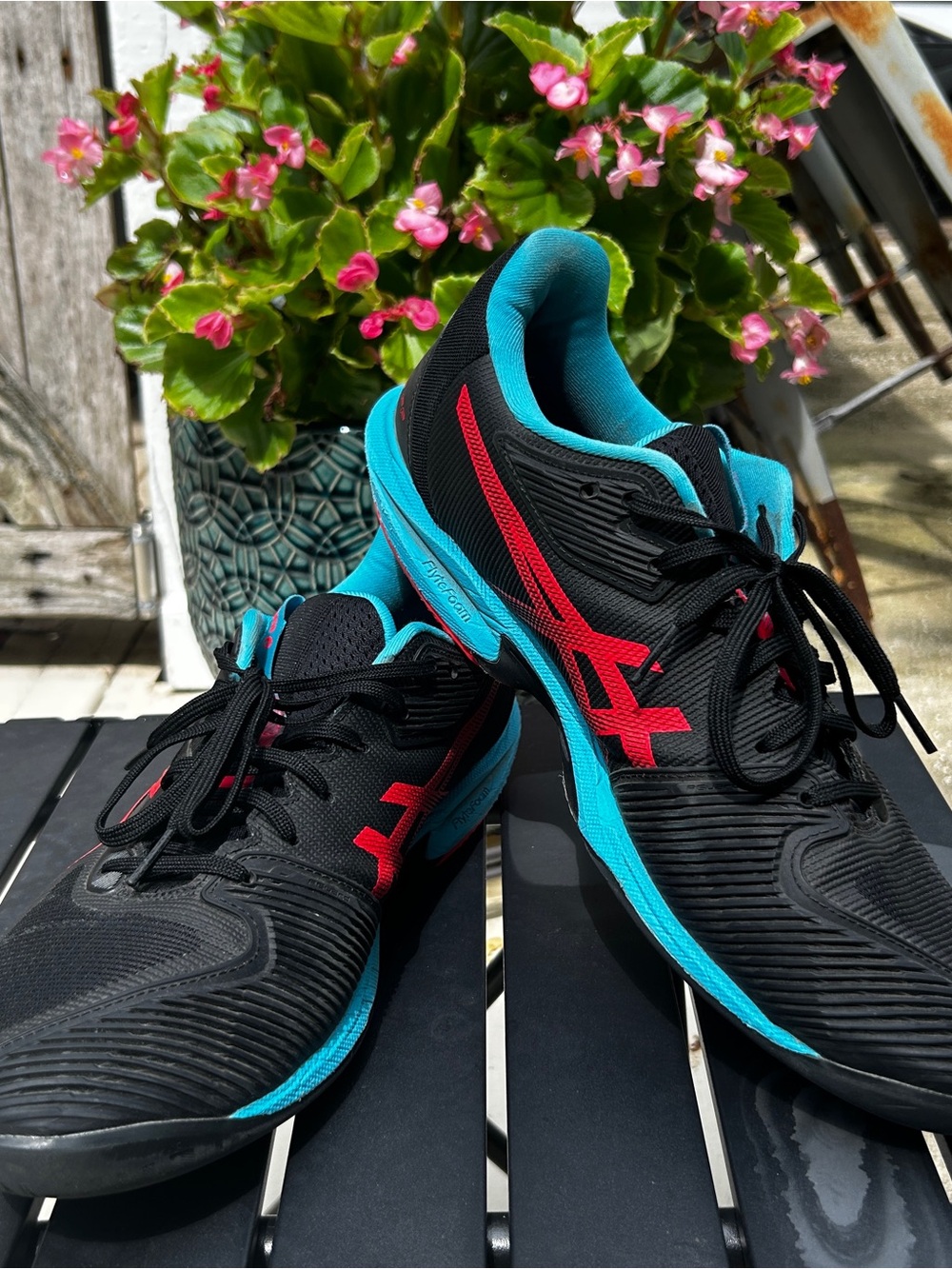 Asics Men’s Solution Speed FF Black Running Shoes with Teal and Red Accents